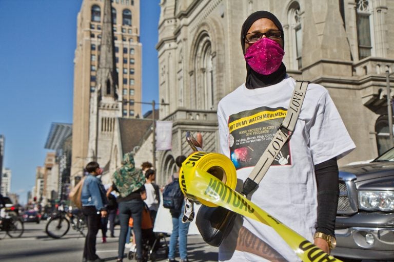 Zahirah Ahmad, a North Philly resident and member of the Not On My Watch movement, joined activists at a rally and march at City Hall in Philadelphia on March 26, 2021, to demand the city put more resources to preventing gun violence. (Kimberly Paynter/WHYY)