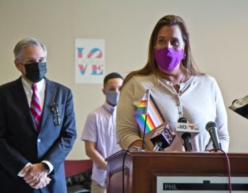 Deja Lynn Alvarez speaks at a podium