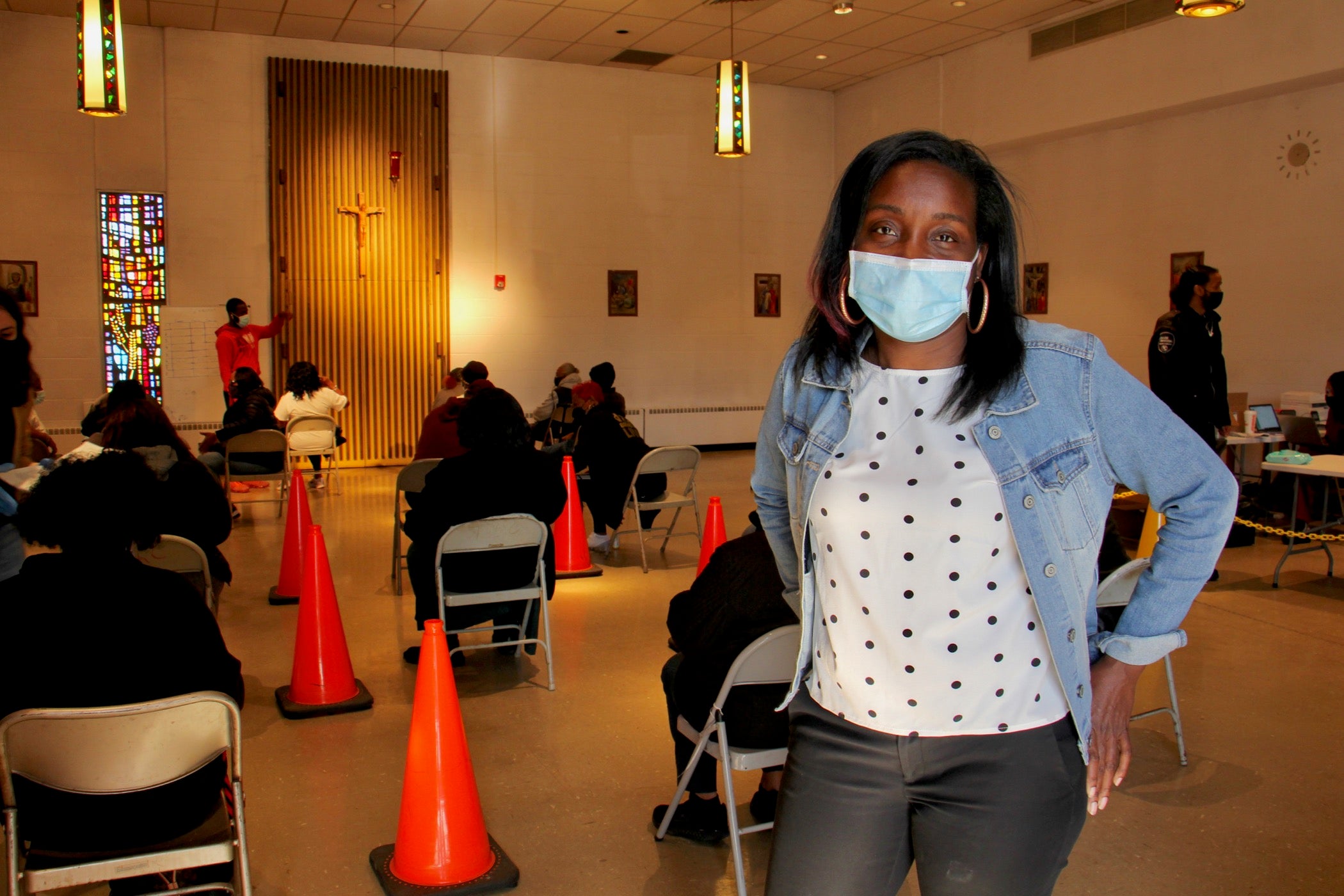 Kirsten Britt wears a face mask at a COVID-19 vaccine clinic