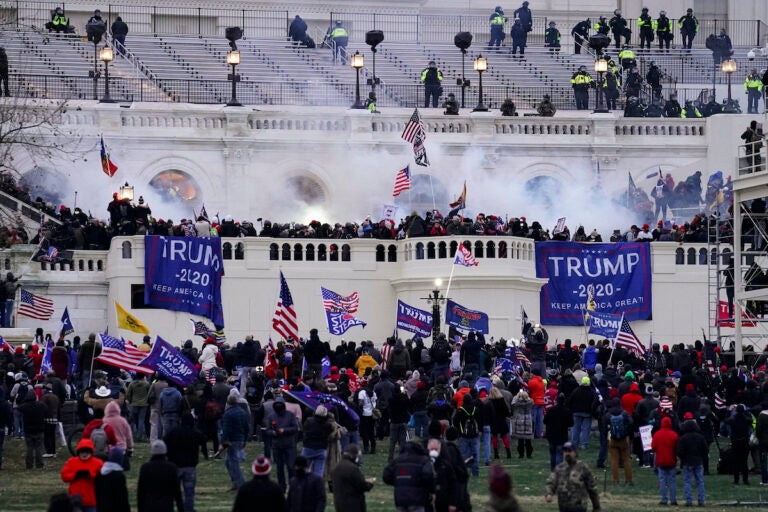 In this Wednesday, Jan. 6, 2021, file photo, rioters storm the Capitol, in Washington. (AP Photo/John Minchillo)
