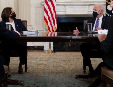 President Joe Biden speaks with Vice President Kamala Harris about the southern border during a meeting in the State Dining Room of the White House, Wednesday, March 24, 2021, in Washington. (AP Photo/Evan Vucci)