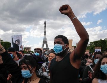 In this June 6, 2020, file photo, hundreds of demonstrators gather on the Champs de Mars as the Eiffel Tower is seen in the background during a demonstration in Paris to protest against the recent killing of George Floyd. (AP Photo/Francois Mori)