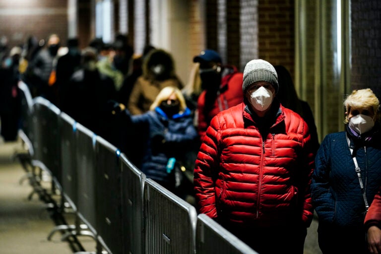 Virus Outbreak Pennsylvania People wait in line at a FEMA Community Vaccination Center at the Pennsylvania Convention Center