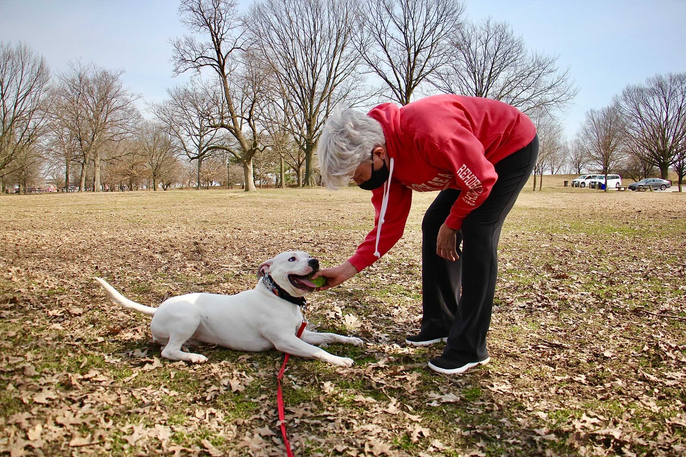 Michelle Davidson plays with her dog, Luna, at FDR Park