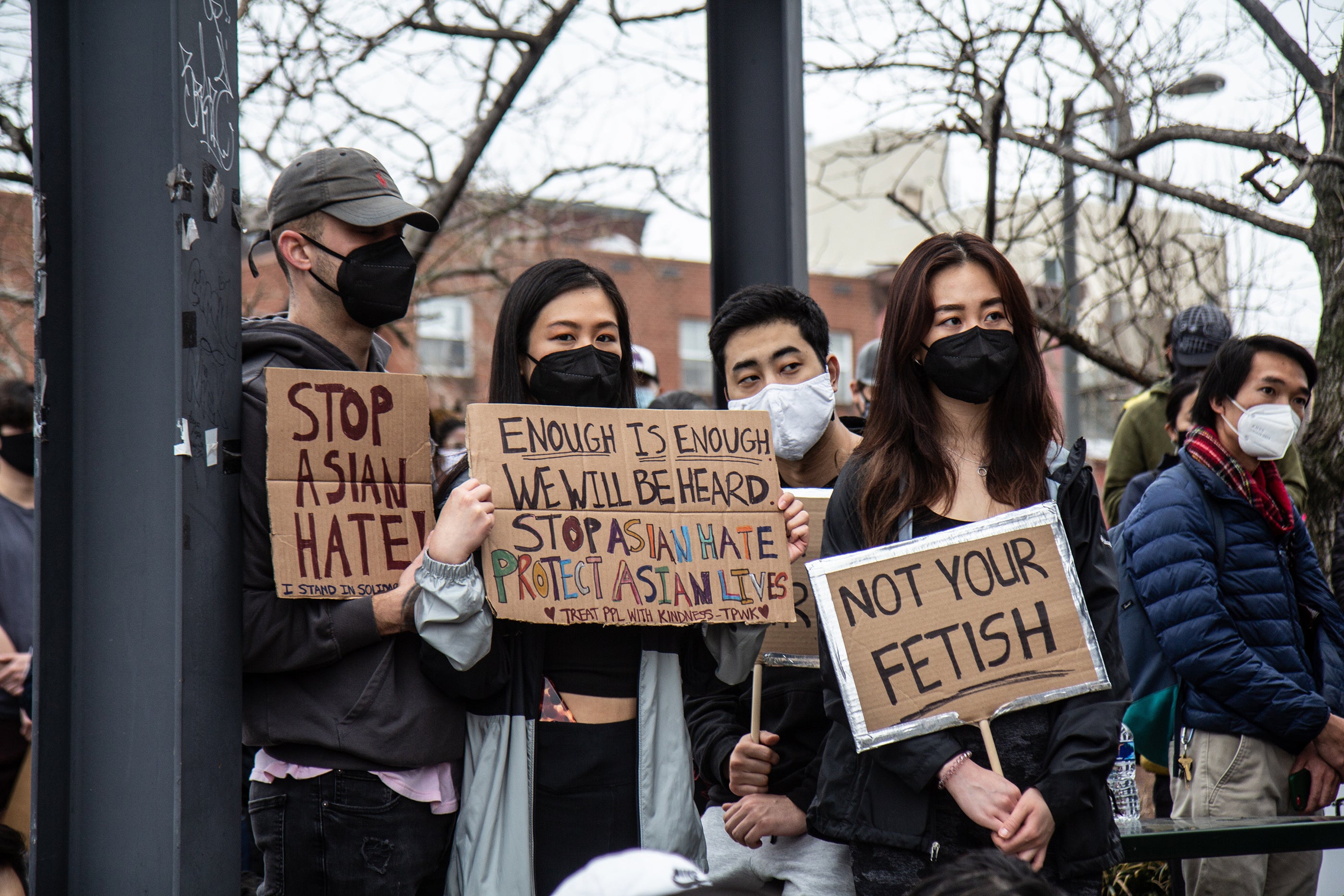 Philadelphians gathered on 10th Street in Chinatown for a solidarity rally and march against violence directed at Asian Americans on March 25, 2021. (Kimberly Paynter/WHYY)