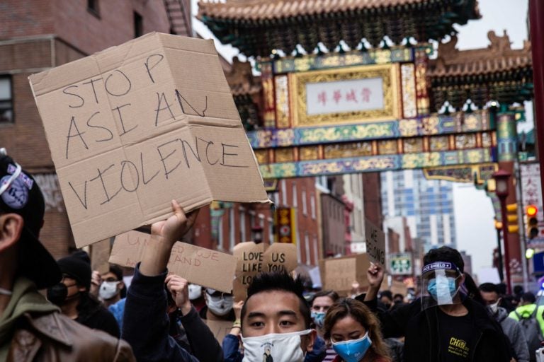 Philadelphians gathered on 10th street in Chinatown for a solidarity rally and march against violence directed at Asian Americans on March 25, 2021. (Kimberly Paynter/WHYY)