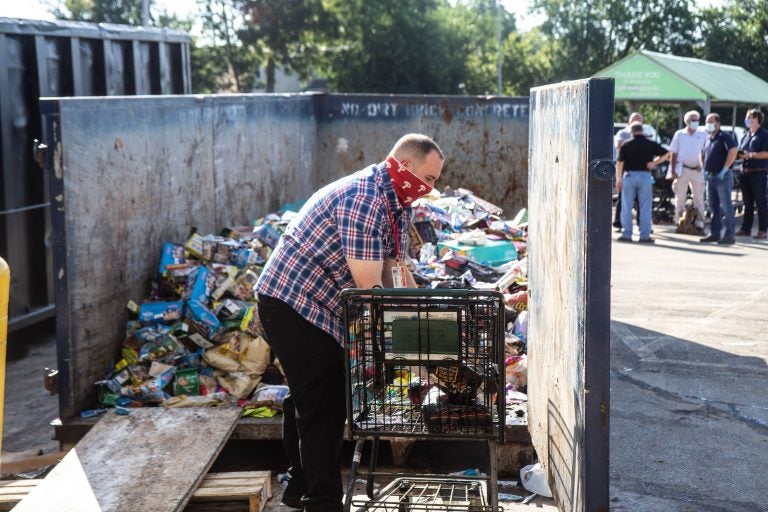 A Fresh Grocer employee in Upper Darby threw away thousands of flood-damaged food items due to a flood in August 2020. (Kimberly Paynter/WHYY)