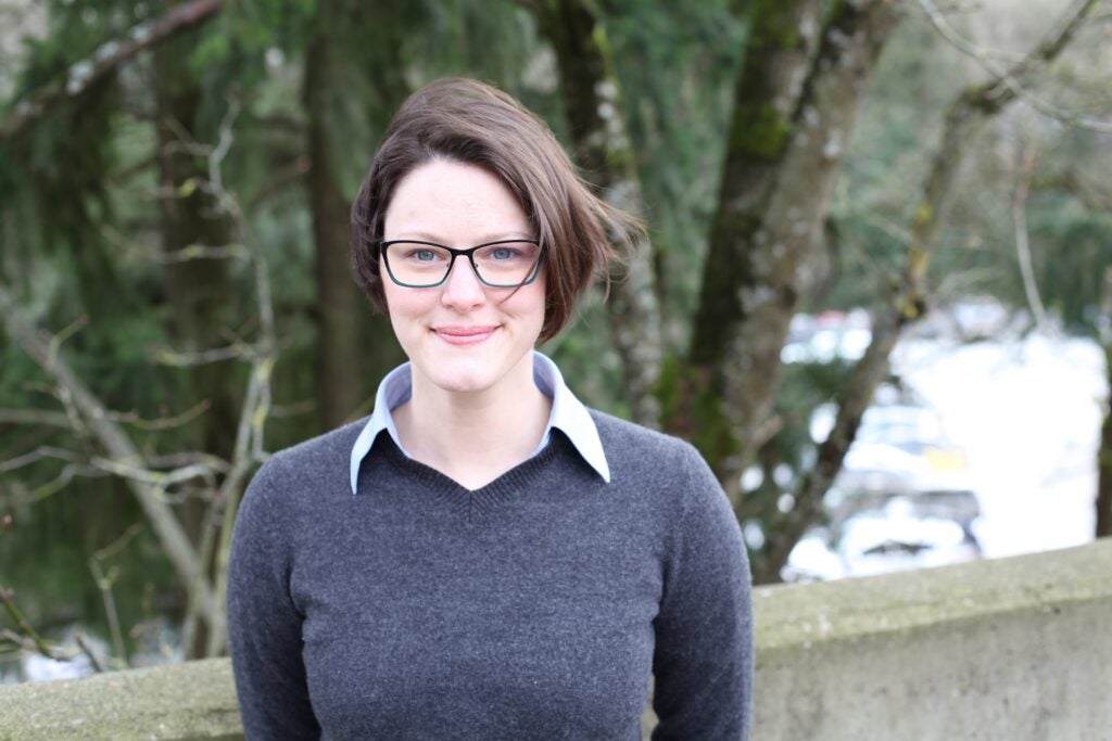 Portrait of Mollie Marr in front of trees