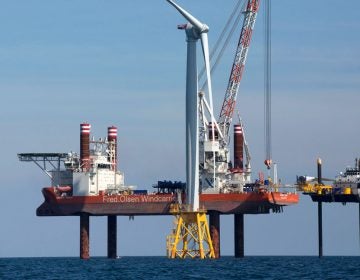 Aug. 15, 2016, a wind turbine, front, being assembled off Block Island, Rhode Island. (Michael Dwyer/AP Photo)