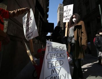 Michelle Perry protests Pa.'s unemployment system in front of Gov. Tom Wolf's Center City office