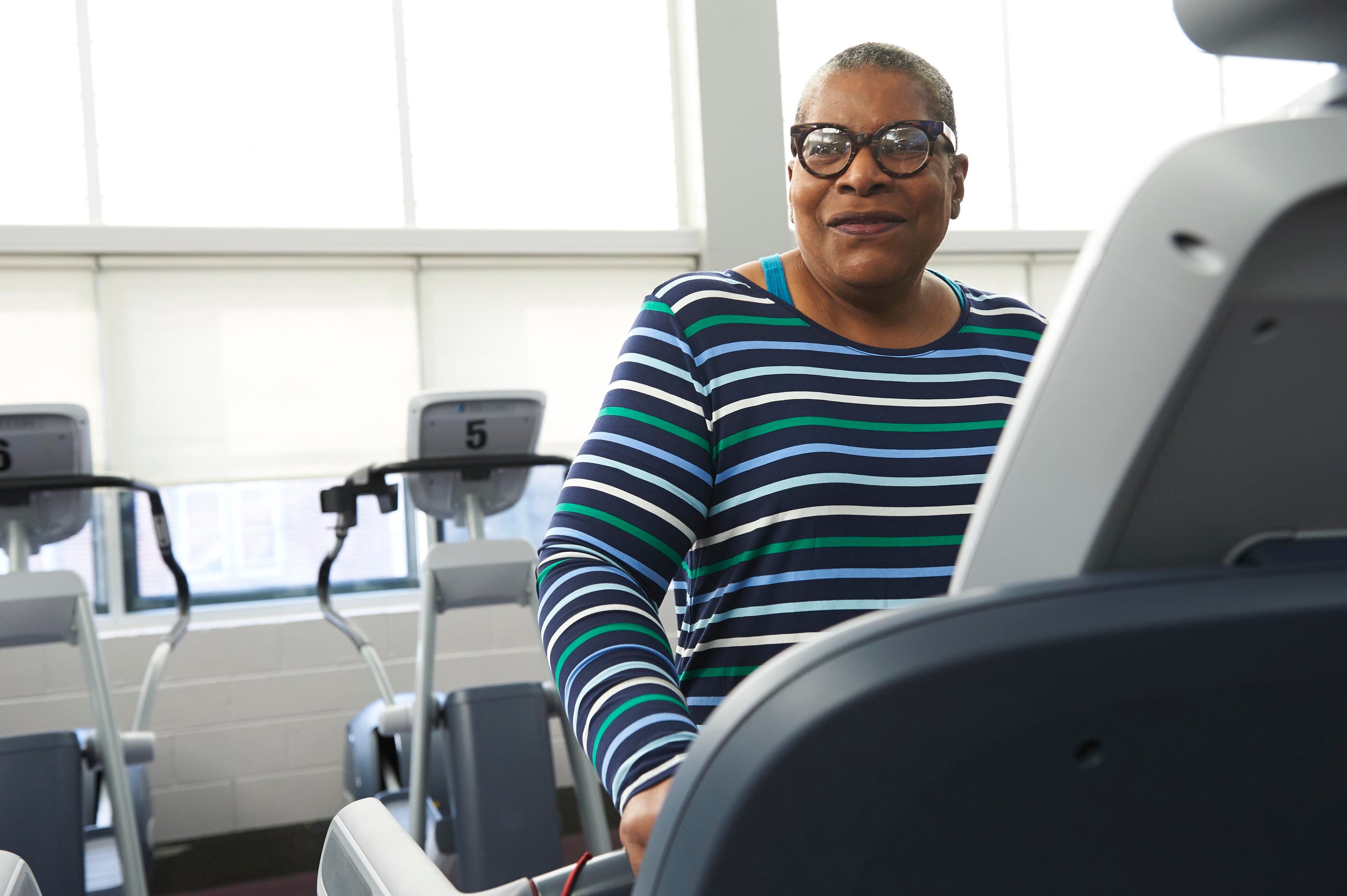 Phyllis Carter exercises on a treadmill