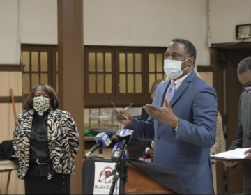 Rev. Gregory Holston discusses the Black Clergy of Philadelphia's plan to help eliminate gun violence during a news conference at Janes Memorial United Methodist Church in Germantown. (Abdul R. Sulayman/Philadelphia Tribune)