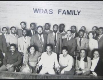Tony Brown sits in the front row fourth from the left with Dyana Williams to his immediate left. Cody Anderson stands immediately behind Brown. Jerry Wells sits third from the right.
