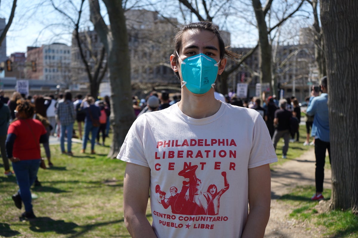 Wai Lee Chin Feman, a volunteer with the Philadelphia Liberation Center, was one of the speakers during the rally against anti-Asian violence in Philadelphia on March 27, 2021. (Kenny Cooper/WHYY)