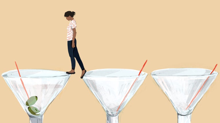 An illustration of a woman standing on martini glasses.