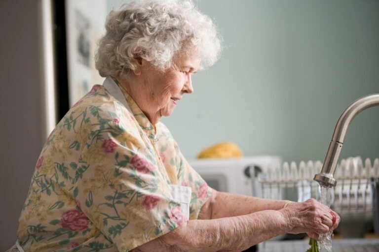 Older adult washing hands