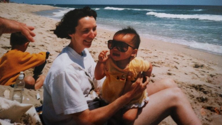 Emma LeMay, now 22, with her mother at the Jersey shore. LeMay, adopted from Chongqing China, was raised in Vermont and now lives in Atlanta. (Emma LeMay)