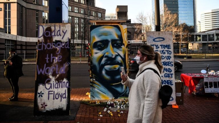 A painting of Floyd is seen outside the Hennepin County Government Center