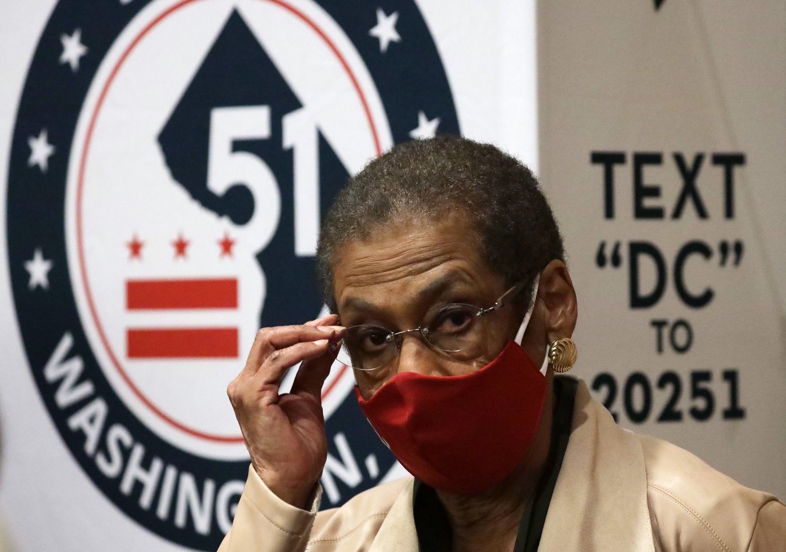 U.S. Rep. Eleanor Holmes Norton (D-DC) listens during a news conference