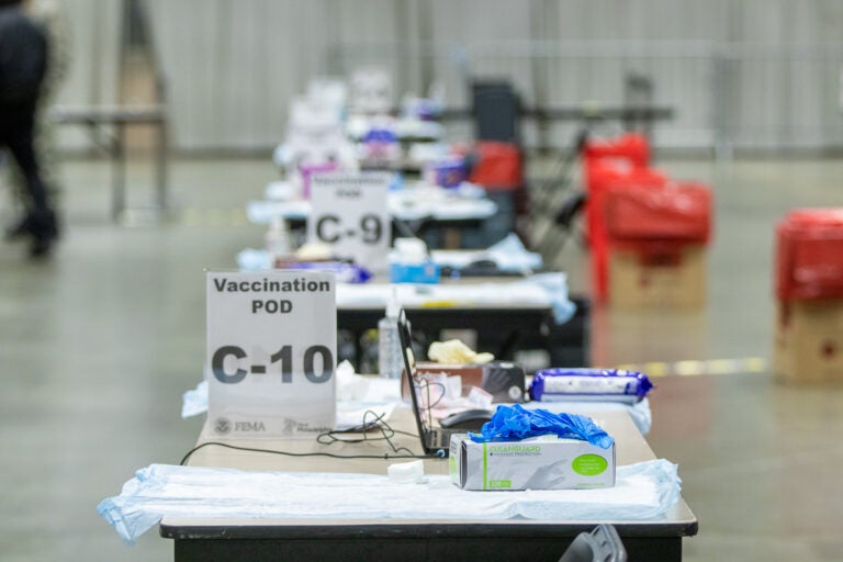 Tables are set up inside the FEMA-run coronavirus vaccination site at the Pennsylvania Convention Center in Philadelphia