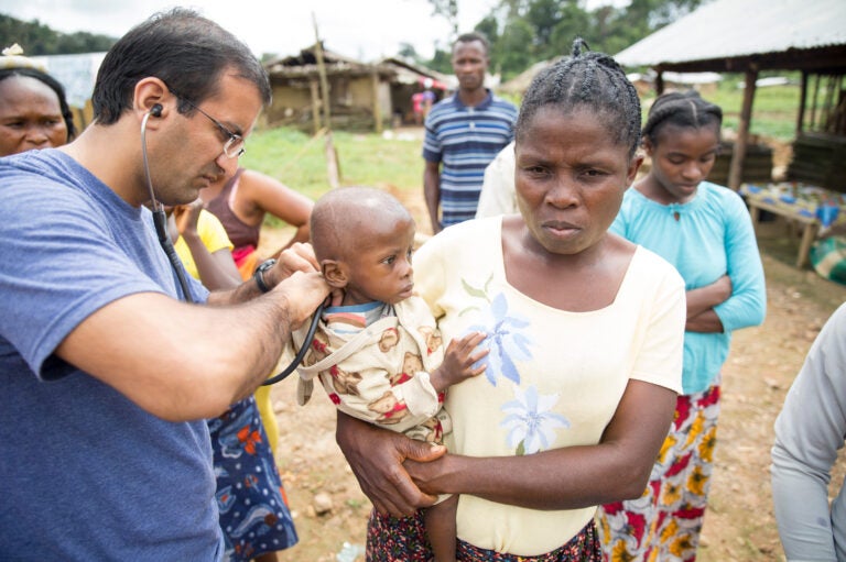 Dr. Raj Panjabi, the newly named head of the President's Malaria Initiative, treating patients during a visit to Liberia, where he was born and lived until 1990. He'll lead the effort to prevent and treat malaria around the world. Each year, some 400,000 people die of a disease that, he notes, is 