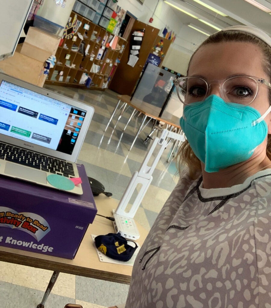 Samantha Rutherford wears a face mask inside Mary McLeod Bethune Elementary