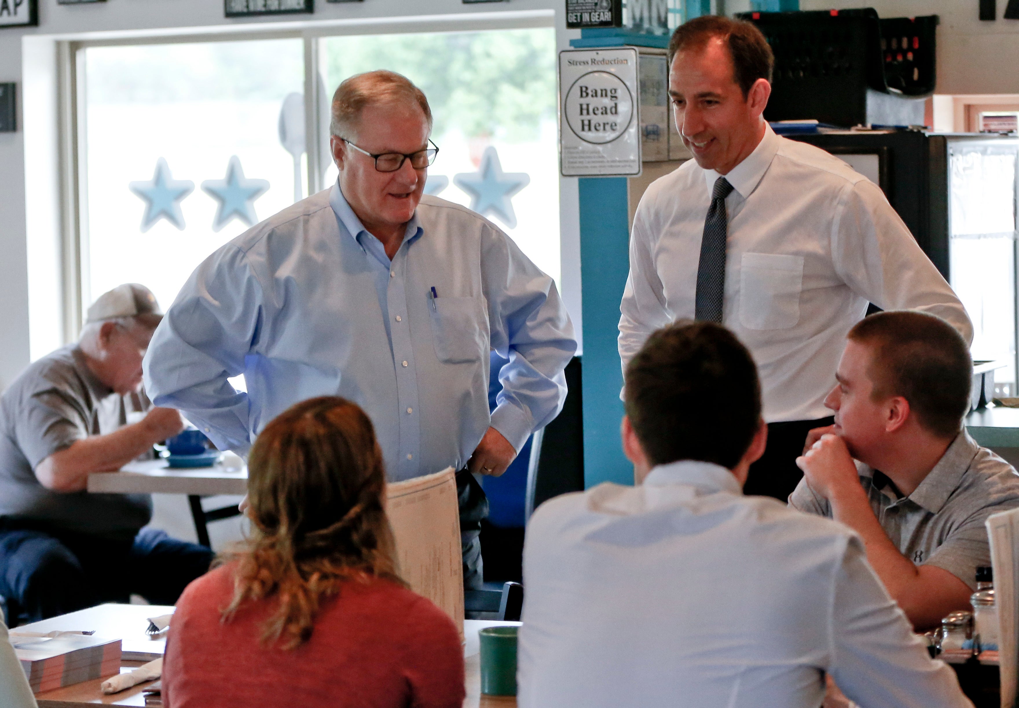 Scott Wagner and Jeff Bartos campaign at a diner in 2018