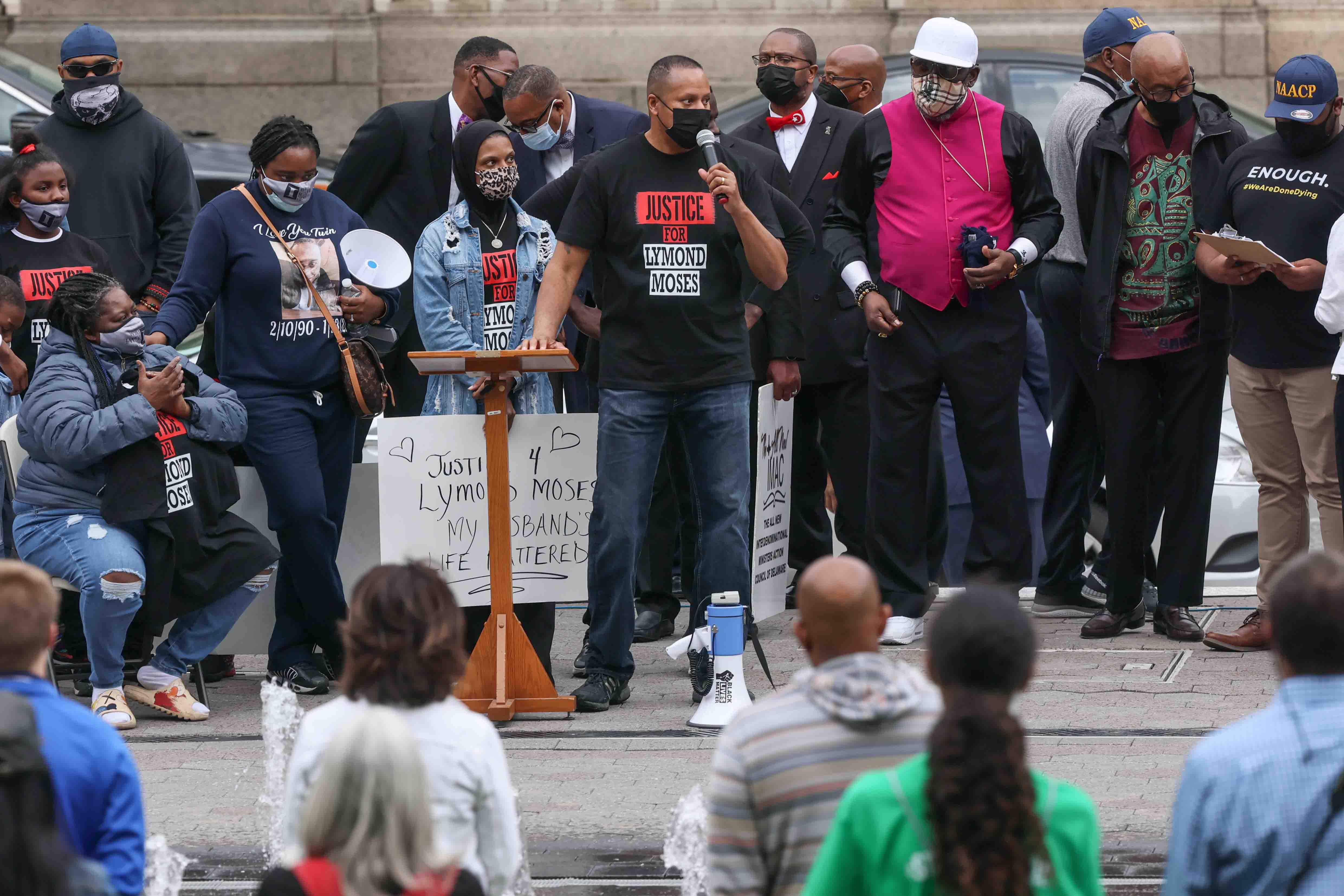 Community activists and former police officer Terence Jones give remarks during a We Still Can’t Breathe March
