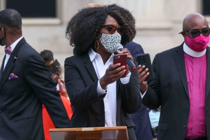 Rep. Kendra Johnson (D) gives remarks during a We Still Can’t Breathe March