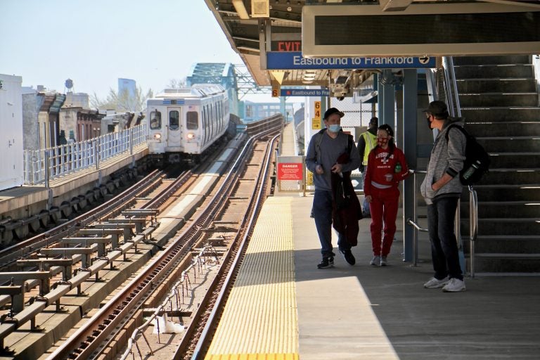 Passengers wait at the Somerset Statio