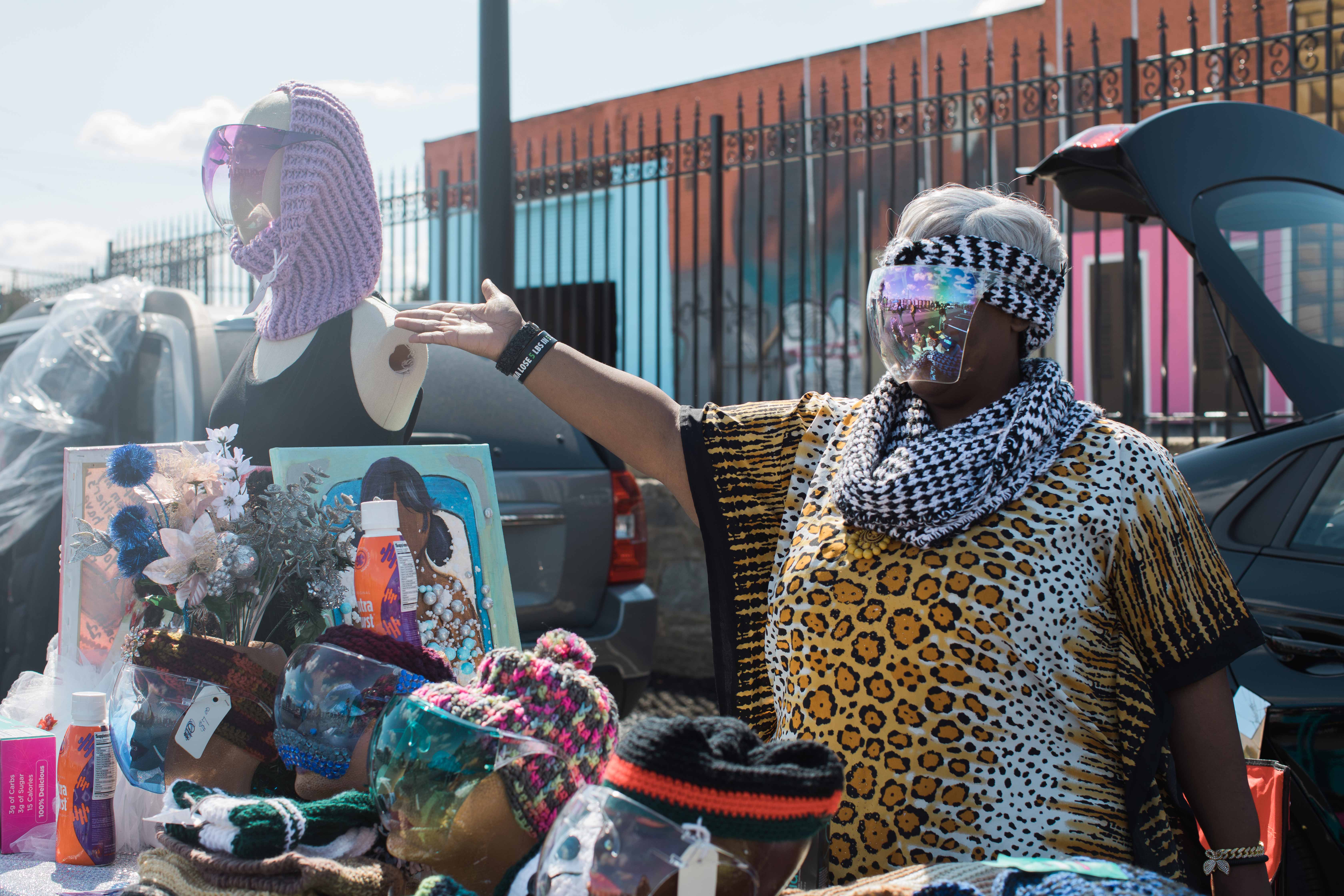 Sonja Caesar, a retired cosmetologist from North Philadelphia, sells arts and crafts at La Placita on Sunday, April 18, 2021. (Becca Haydu for WHYY)