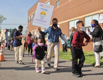 Teachers escort students to H.B. Wilson Elementary School