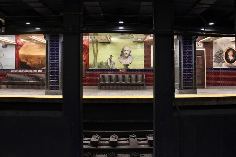 A series of murals by Tom Judd at the 5th Street/Independence Hall stop on the Market-Frankford line. (Emma Lee/WHYY)