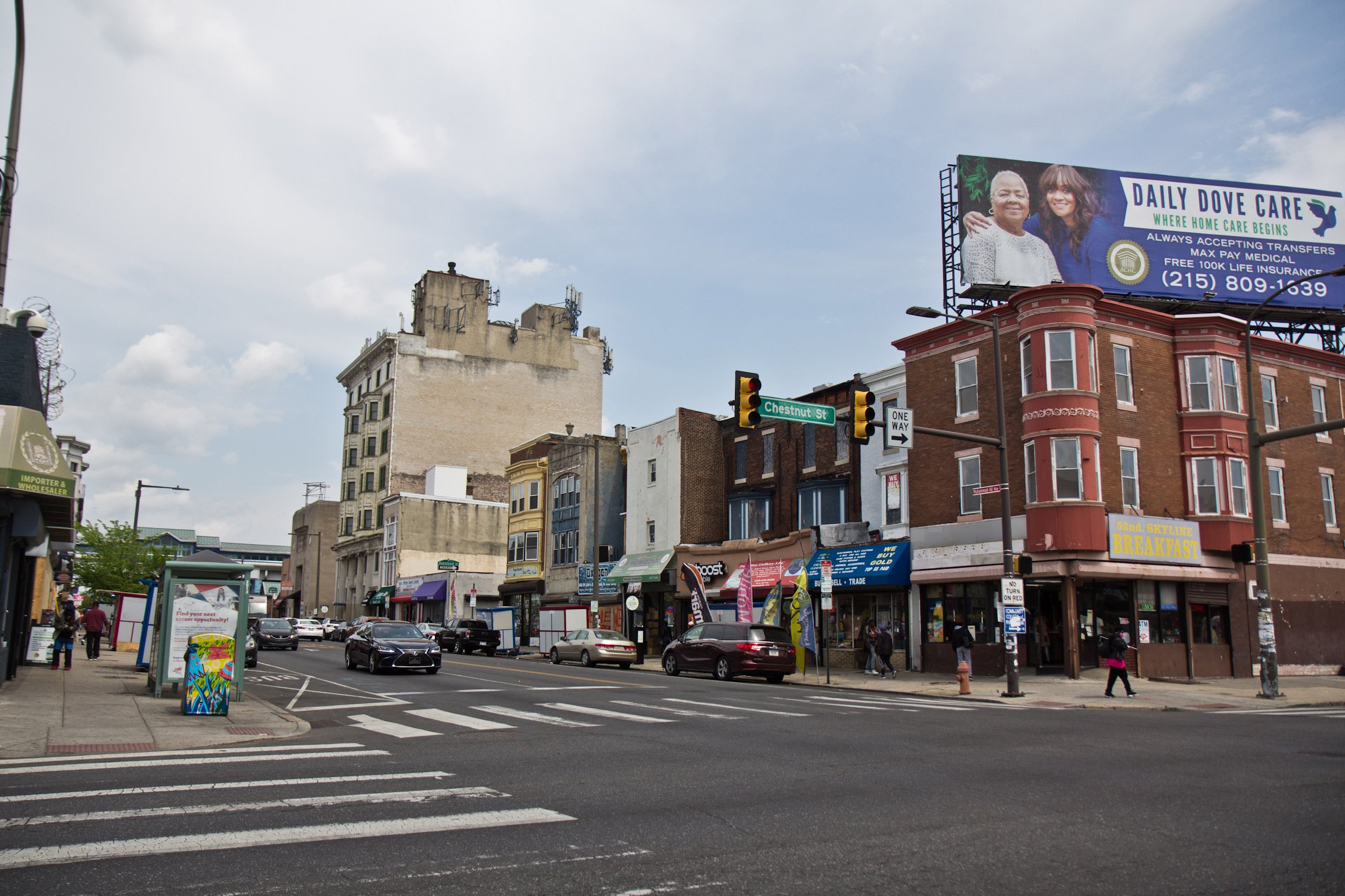 Shops on 52nd Street in West Philadelphia were mostly open the day after the guilty verdict in the trial of Derek Chauvin was delivered on April 21, 2021. (Kimberly Paynter/WHYY)