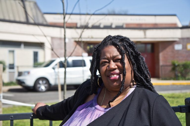 Mary McLeod Bethune Elementary Principal Aliya Catanch-Bradley stands in front of trees planted in Fall 2020. (Kimberly Paynter/WHYY)