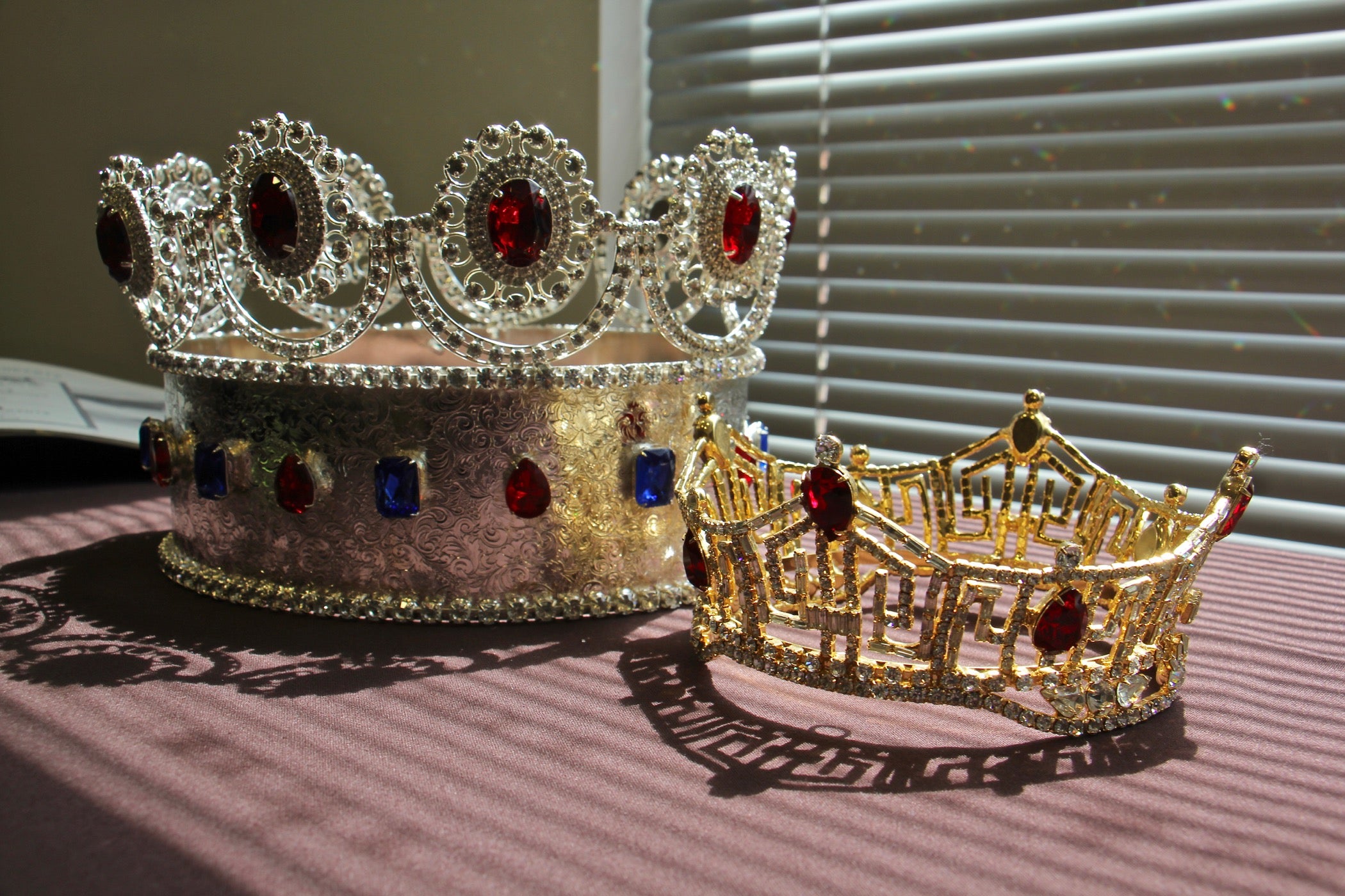 Two different crowns worn by Miss America winners