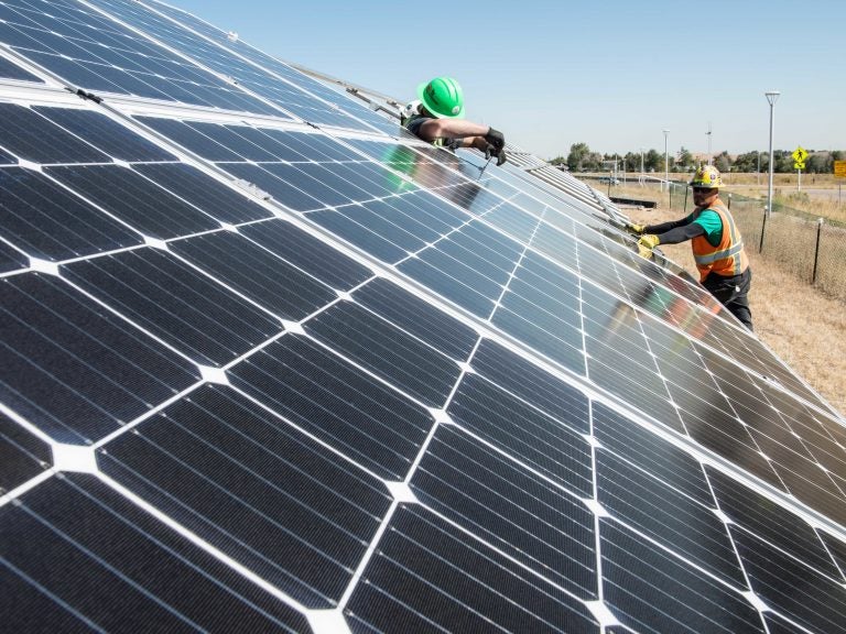 To cut carbon emissions, President Biden announced an initiative to further cut the cost of solar installations, like this one being tested at the National Renewable Energy Laboratory in Colorado. (Dennis Schroeder/NREL)