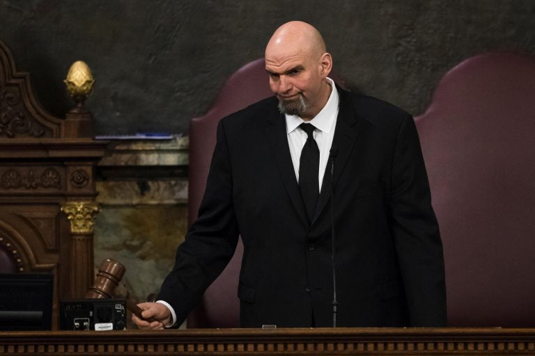 Lt. Gov. John Fetterman gavels in a joint session of the Pennsylvania House and Senate before Democratic Gov. Tom Wolf delivers his budget address for the 2019-20 fiscal year, Harrisburg, Pa., Tuesday, Feb. 5, 2019. (AP Photo/Matt Rourke)