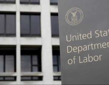 In this May 6, 2020 photo, a sign stands outside the Department of Labor's headquarters in Washington.