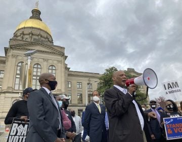 African Methodist Episcopal Church Bishop Reginald Jackson announces a boycott of Coca-Cola Co. products outside the Georgia Capitol on Thursday, March 25, 2021. Jackson says Coca-Cola and other large Georgia companies haven’t done enough to oppose restrictive voting bills that Georgia lawmakers were debating as Jackson spoke (AP Photo/Jeff Amy)


Sent from my iPhone