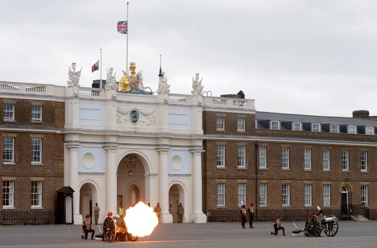 Soldiers of the Royal Horse Artillery fire a ceremonial gun during the 41 Death Gun salute in memory of Prince Philip at the Royal Artillery barracks in Woolwich, London, Saturday, April 10, 2021. (AP Photo/Alastair Grant, Pool)