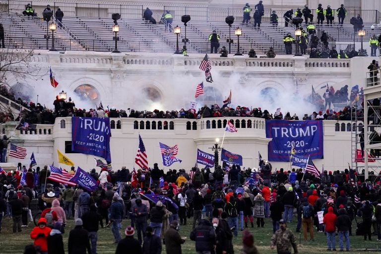 In this Wednesday, Jan. 6, 2021, file photo, violent rioters storm the Capitol, in Washington. New details from the deadly riot of Jan. 6 are contained in a previously undisclosed document prepared by the Pentagon for internal use that was obtained by the Associated Press and vetted by current and former government officials. (AP Photo/John Minchillo)