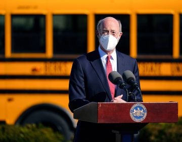 In this March 15, 2021 file photo, Gov. Tom Wolf speaks at a COVID-19 vaccination site setup at the Berks County Intermediate Unit in Reading, Pa. (AP Photo/Matt Rourke)
