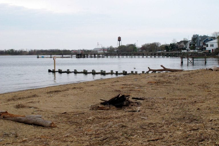 This Tuesday, April 19, 2021 photo shows the waterfront of Raritan Bay in Keyport, N.J. A Massachusetts company wants to build a high-voltage power line that would come ashore in Keyport and connect electricity from a future wind farm off the New Jersey coast to the onshore electrical grid. (AP Photo/Wayne Parry)
