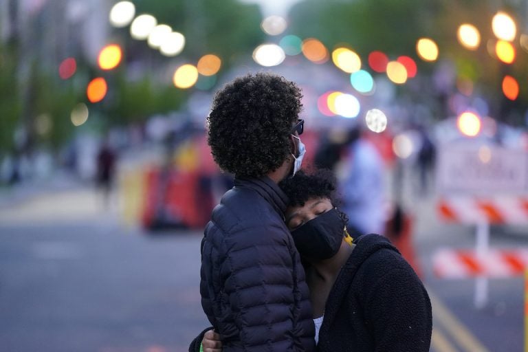 George Floyd Officer Trial Washington A couple dances at Black Lives Matter Plaza near the White House on Tuesday, April 20, 2021, in Washington, after the verdict in Minneapolis, in the murder trial against former Minneapolis police officer Derek Chauvin was announced. (AP Photo/Alex Brandon)