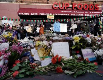 People gather at Cup Foods after a guilty verdict was announced at the trial of former Minneapolis police Officer Derek Chauvin for the 2020 death of George Floyd, Tuesday, April 20, 2021, in Minneapolis, Minn. Former Minneapolis police Officer Derek Chauvin has been convicted of murder and manslaughter in the death of Floyd. (AP Photo/Morry Gash)