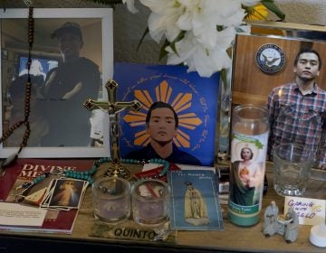 Images of Angelo Quinto are displayed at his family’s home