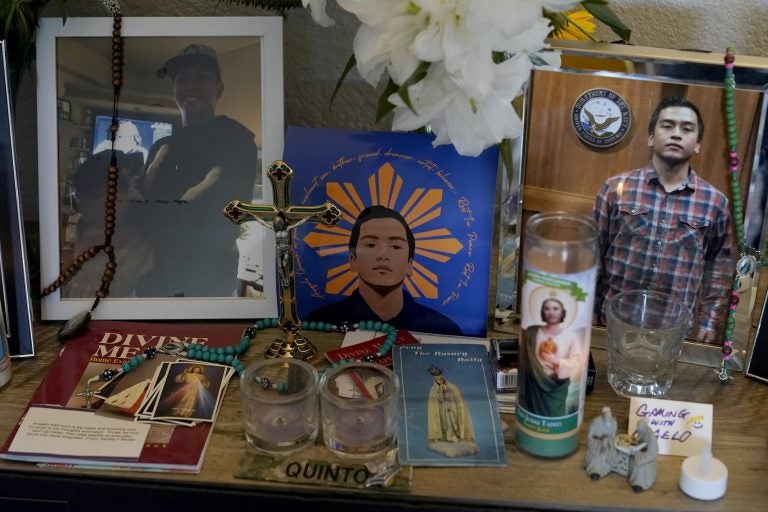 Images of Angelo Quinto are displayed at his family’s home