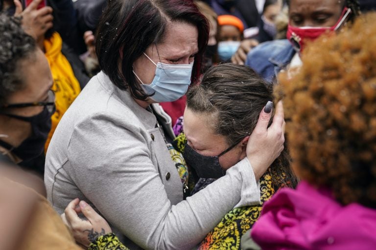 Courtney Ross hugs Katie Wright