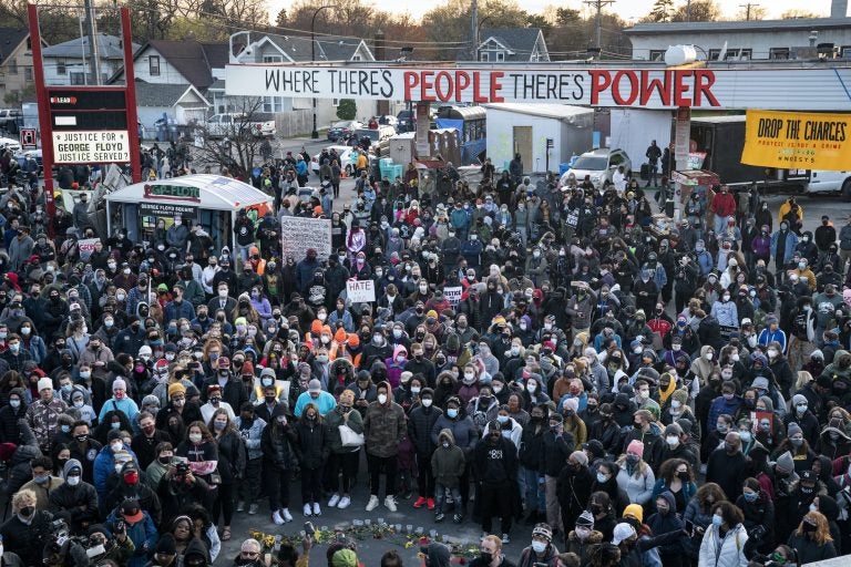 Demonstrators gather outside Cup Foods to celebrate the murder conviction of former Minneapolis police officer Derek Chauvin in the killing of George Floyd